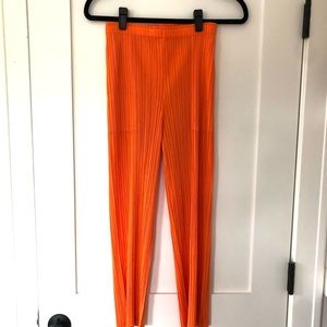 Size 2 orange Issey Miyake Pleats Please cropped tapered pant. Worn twice!